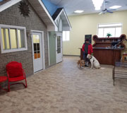 New lobby with a dog bone shaped reception desk